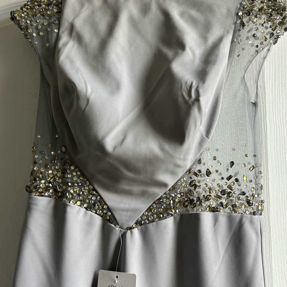 Size 10 party dress. Rhinestone embellishments. Satin lining. NWT.